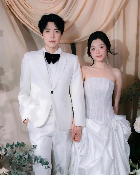 Paige and Aiden, full-length portrait